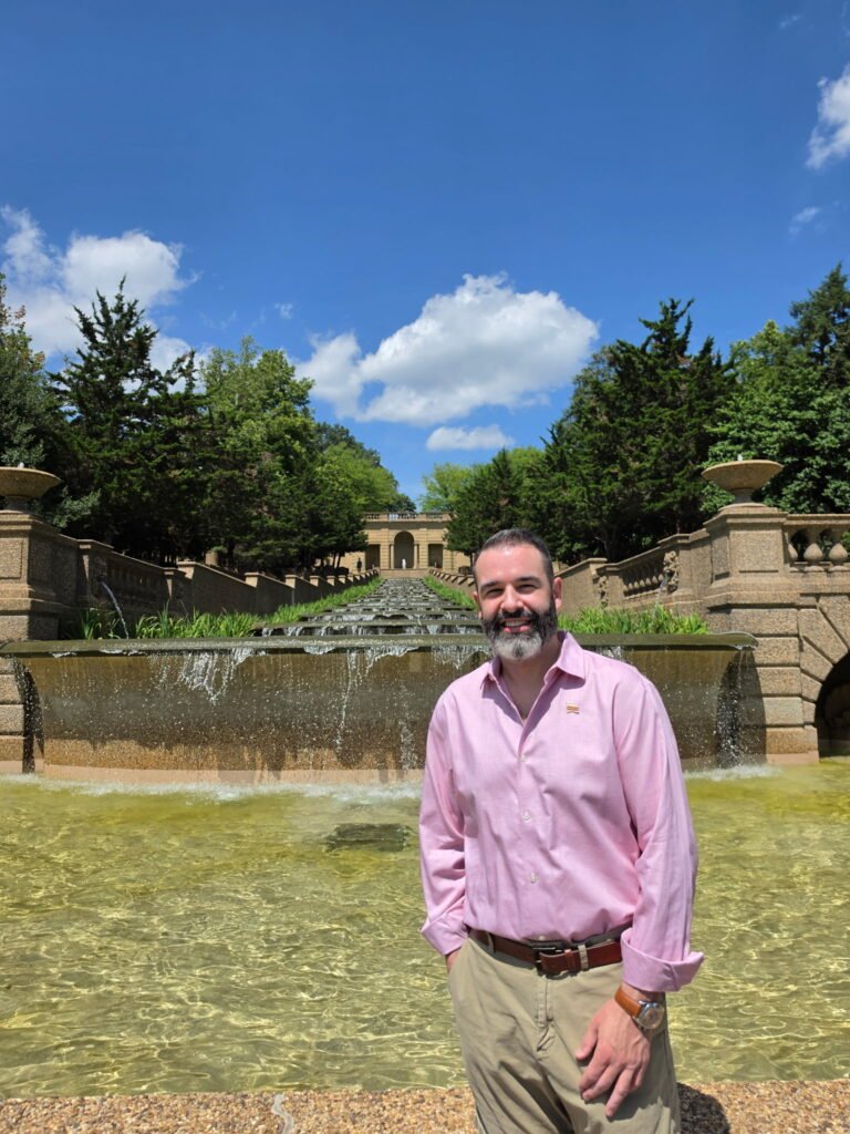 Alan in front of the Malcolm X Park fountain